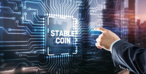 Man clicks on the inscription: Stable Coin. Stablecoins Cryptocurrencies Stable Market Price Value Coin Currency.
