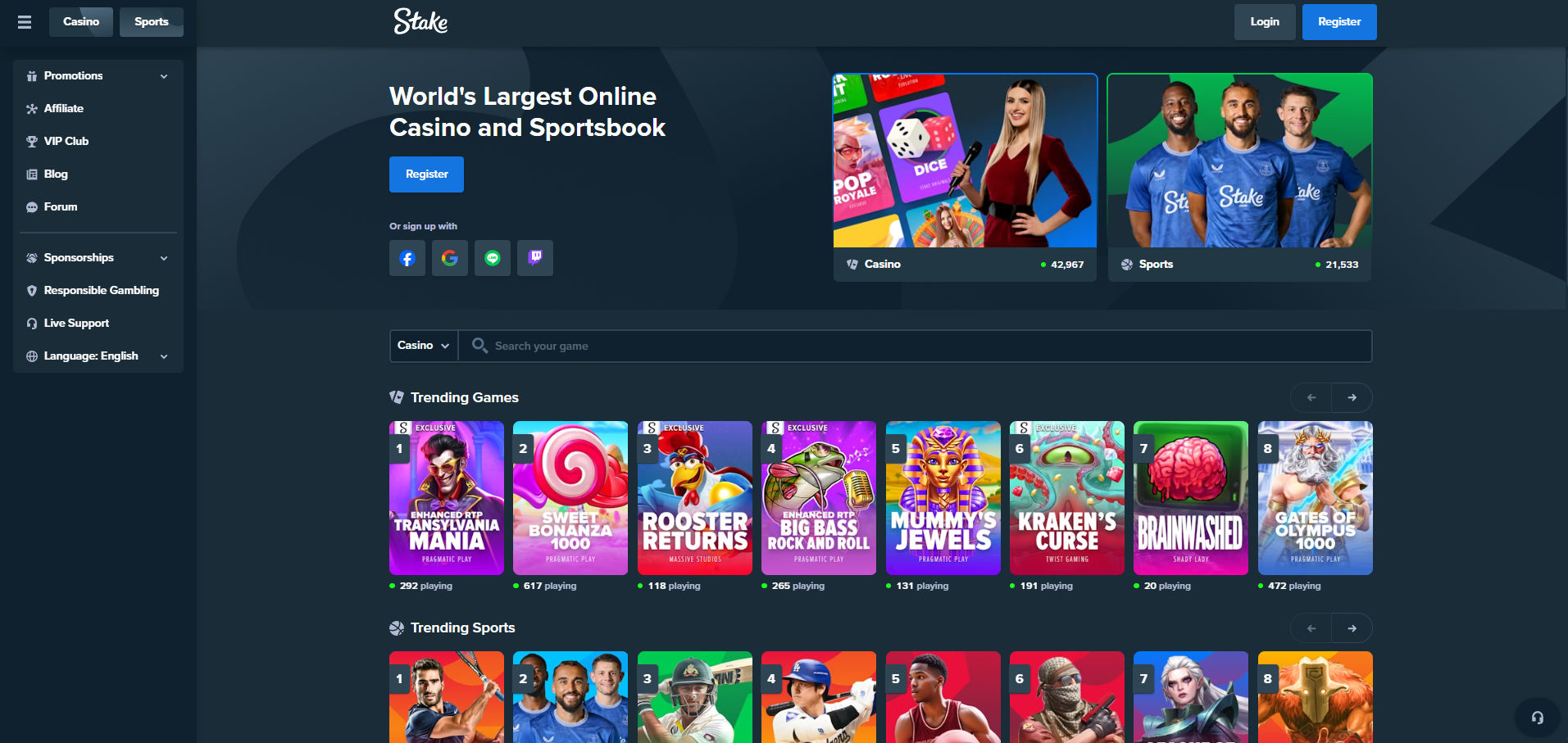 Screenshot of the Stake.com homepage, showcasing the tagline “World’s Largest Online Casino and Sportsbook.” The main section displays a blue “Register” button and login options with Facebook, Google, and Twitch. Two main banners highlight the Casino section (with a live dealer) and Sports section (featuring Stake-sponsored athletes in football kits). The left-hand sidebar includes links for Promotions, Affiliate, VIP Club, Blog, Forum, Sponsorships, Responsible Gambling, Live Support, and Language settings. Below, the “Trending Games” section shows top titles like Transylvania Mania, Sweet Bonanza 1000, Rooster Returns, and Gates of Olympus. The “Trending Sports” section showcases icons for tennis, football, cricket, and more.
